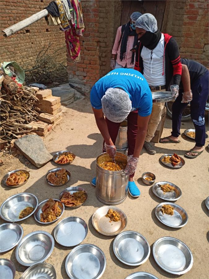 HI-FI Volunteers Serving Meals